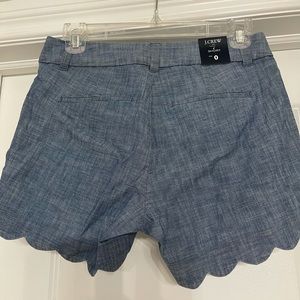 J Crew denim scalloped shorts in chambray color.
